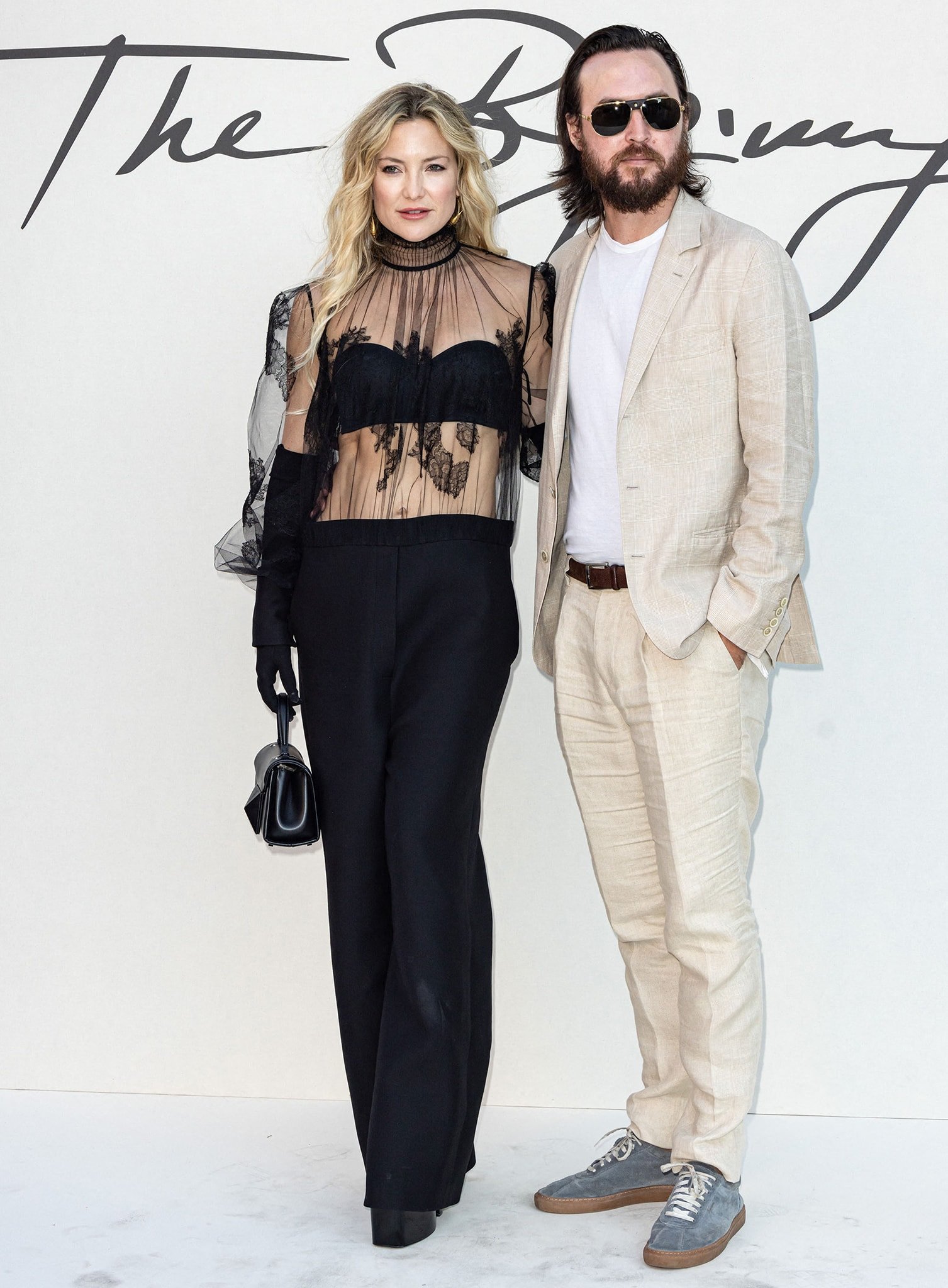 Kate Hudson and Danny Fujikawa at the Valentino fashion show during Rome Fashion Week on July 8, 2022