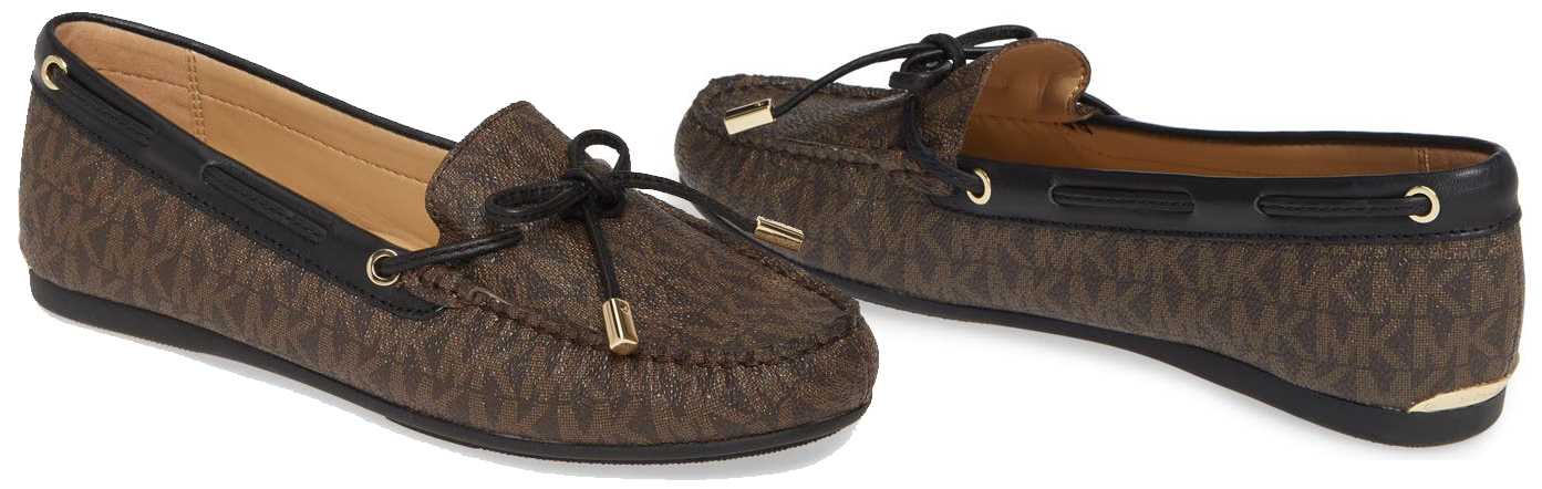 Michael Kors' Sutton Mocs boast the classic monogram design with slender lacing that wraps the heel and ties in a metal-tipped bow at the front