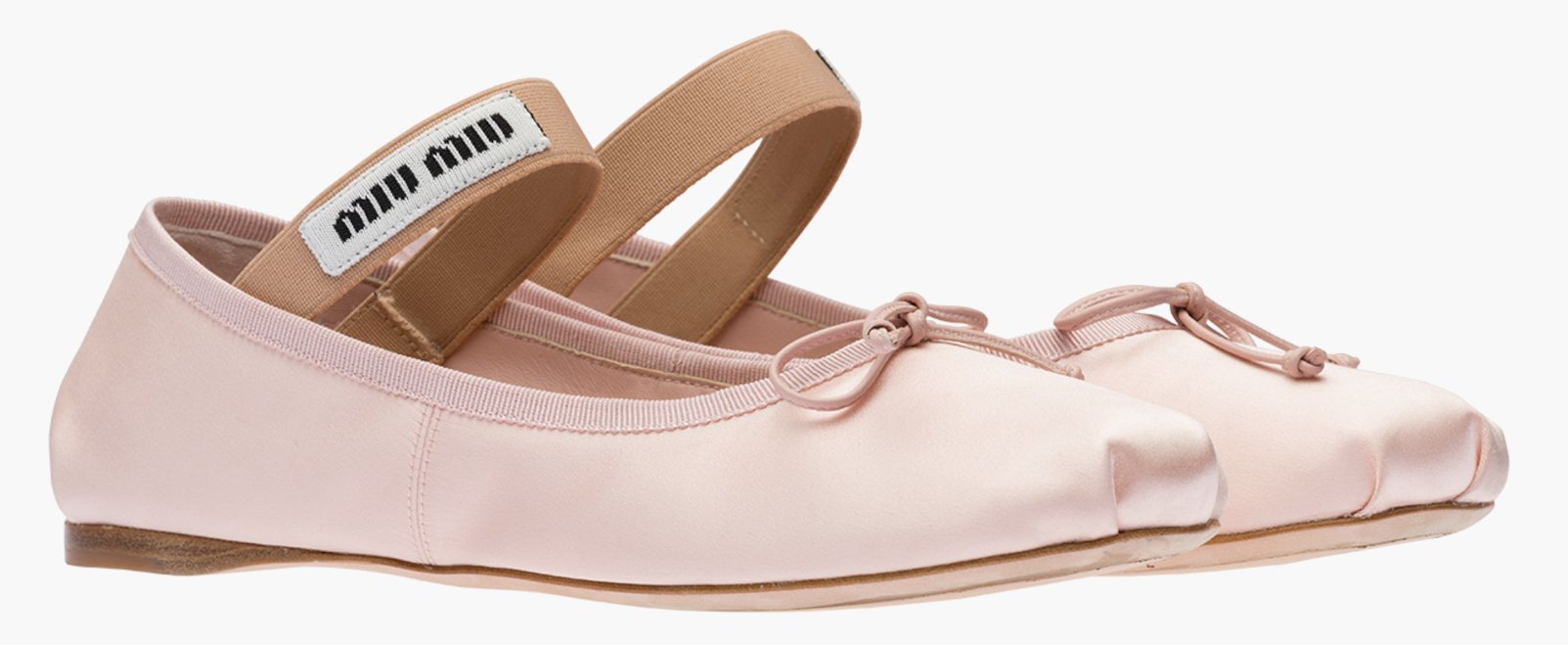 Presented during the Fall/Winter 2022 show, these ballerinas are an iconic Miu Miu style decorated with a feminine bow and a logo-detailed elastic band