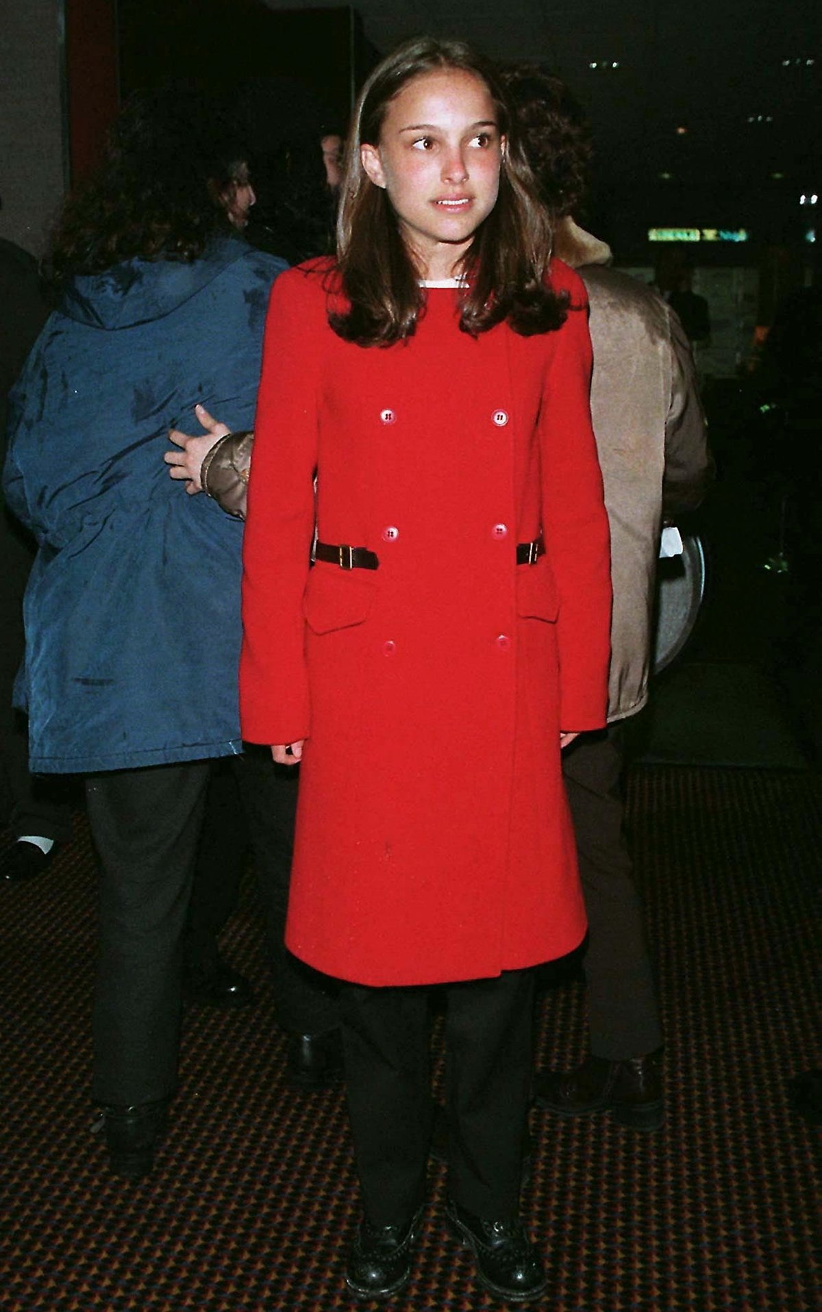 Natalie Portman in a red coat at the premiere of Inventing the Abbotts in Los Angeles