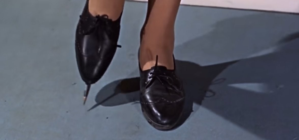 Lotte Lenya as the murderous and sadistic Rosa Klebb with poison-tipped shoes in the 1963 James Bond movie From Russia with Love