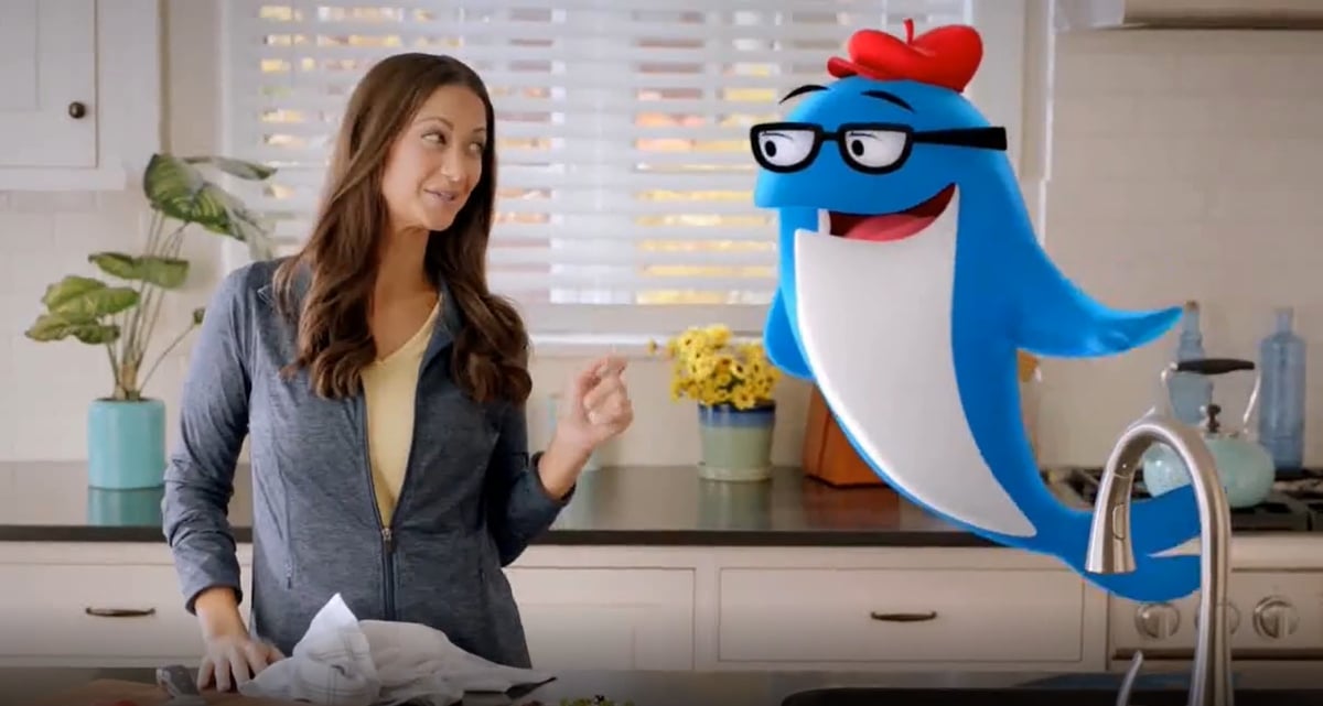 Katie McCarty stars with StarKist's mascot Charlie in commercials for tuna and chicken products