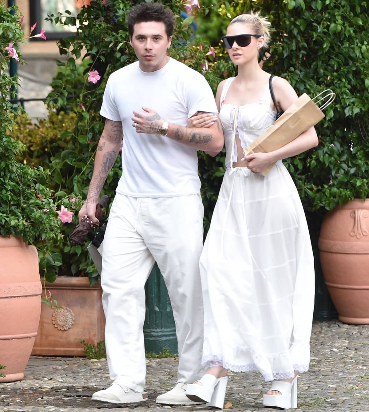 Newlyweds Brooklyn and Nicola Peltz Beckham in matching all-white outfits