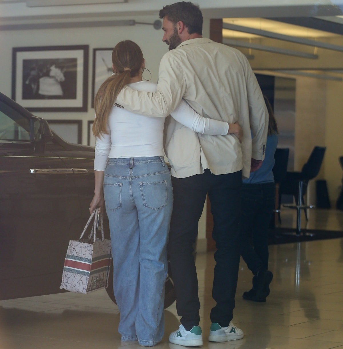 Ben Affleck wrapped his arm around his fiancée Jennifer Lopez as they looked around the Rolls Royce dealership in Los Angeles
