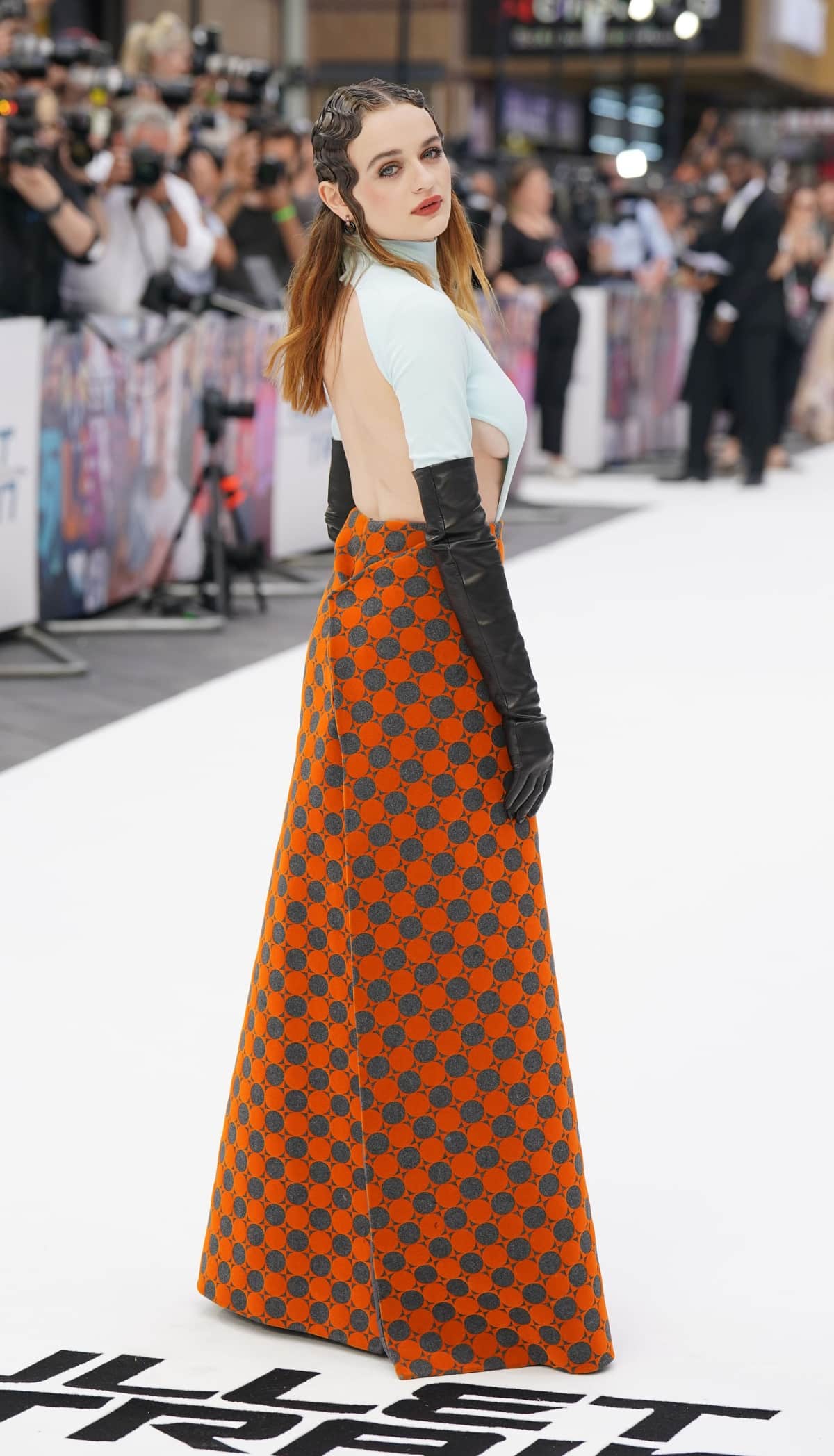 Joey King showing off her sexy open back and flashing a bit of sideboob in a Marc Jacobs Fall 2022 look