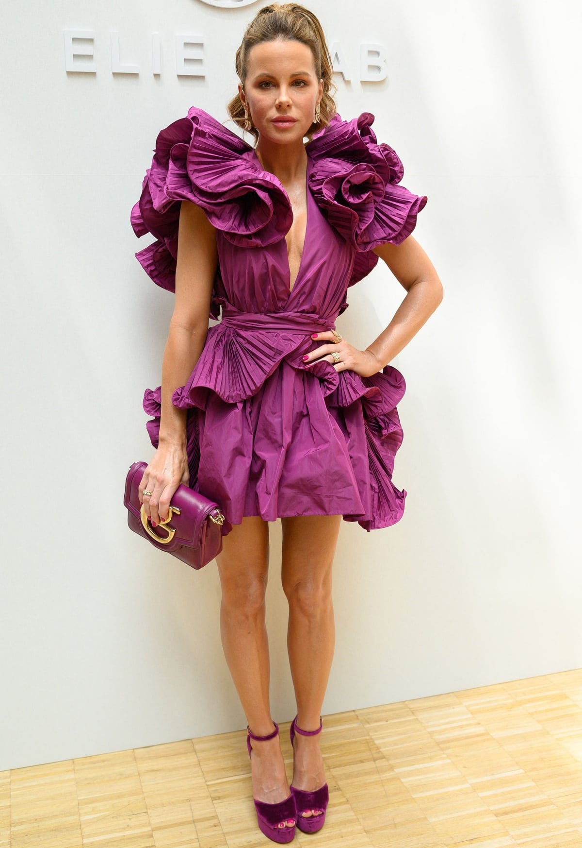 Kate Beckinsale wearing an all-purple Fall 2022 look at the Elie Saab Haute Couture show