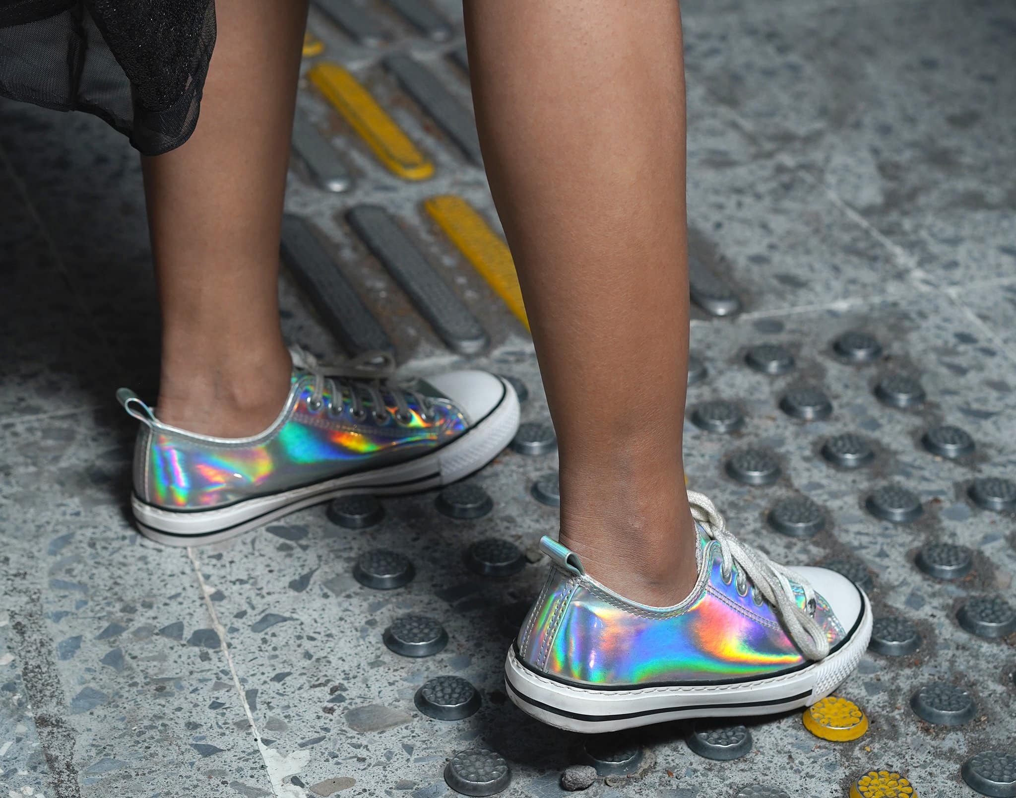 Wearing metallic sneakers is an easy way to add a dose of glam factor to a laid-back outfit
