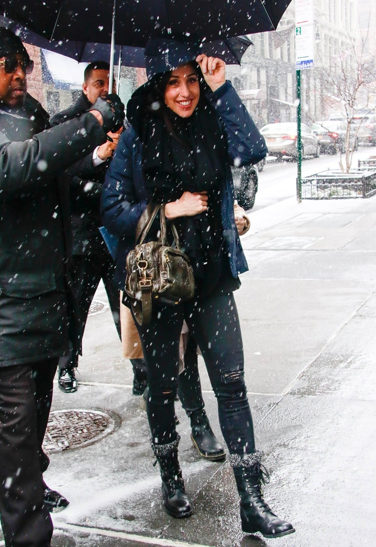 Catherine Reitman braves the snow outside the Build Studio