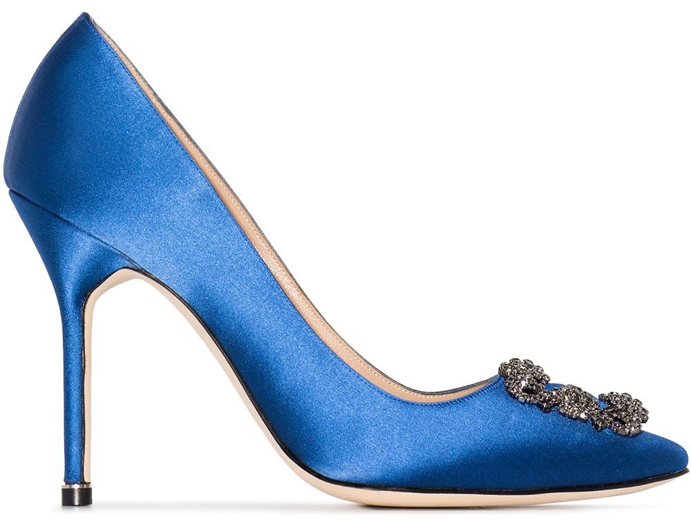 Manolo Blahnik's iconic Hangisi pumps boast a crystal-embellished buckle and a slim stiletto heel