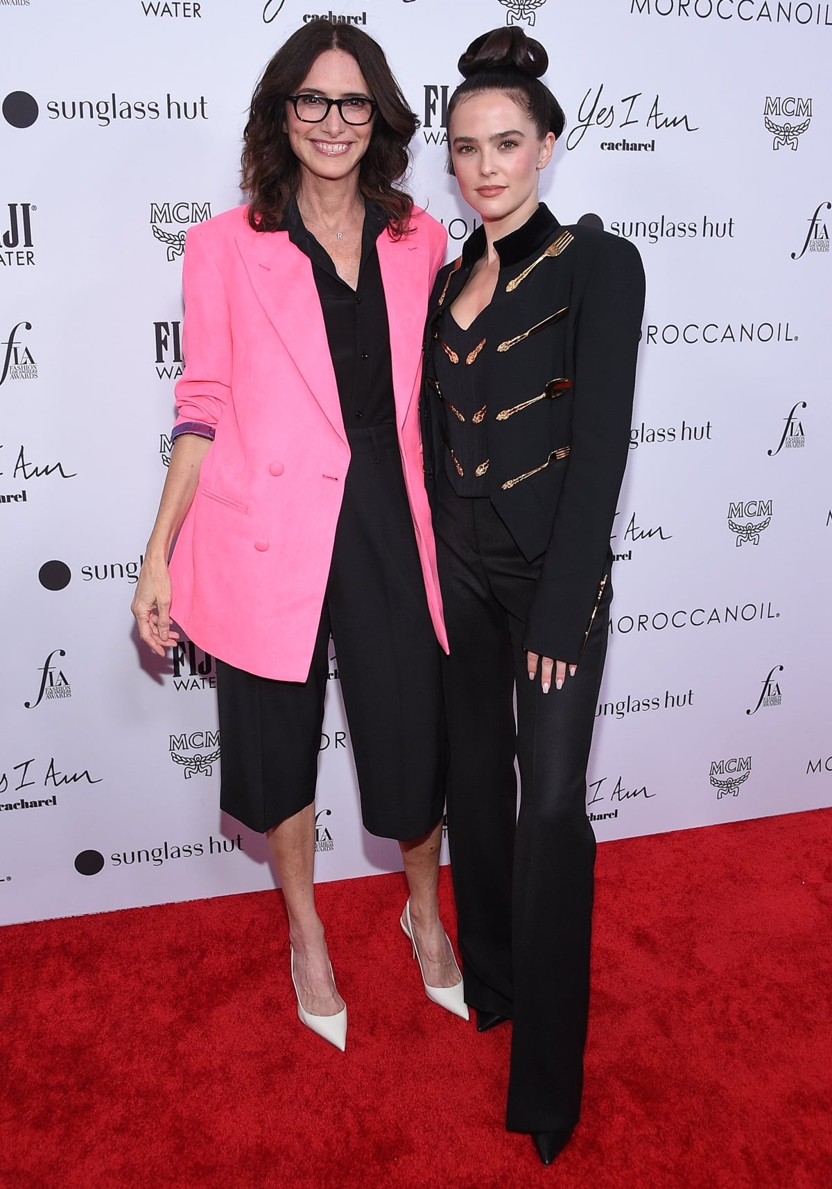 Zoey Deutch in Moschino (R) and Elizabeth Stewart attend The Daily Front Row's 6th Annual Fashion Los Angeles Awards