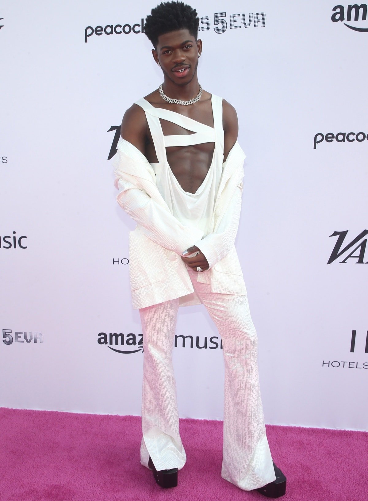 Lil Nas X adding a stylish boost to his height in platform boots at the 2021 Variety Hitmakers event