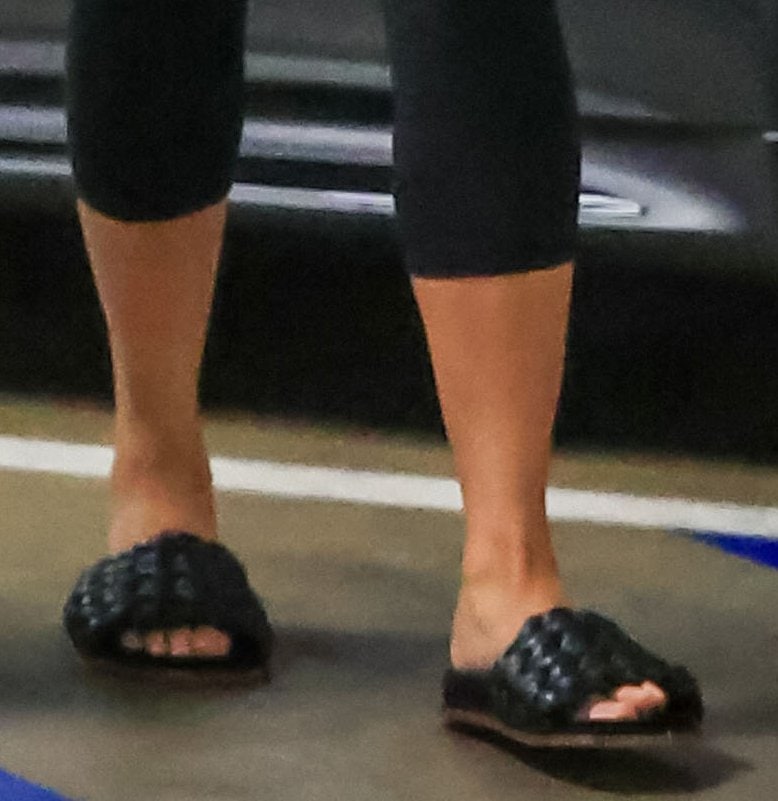 Chrissy Teigen keeps her look comfortable in Chloe Kacey slides