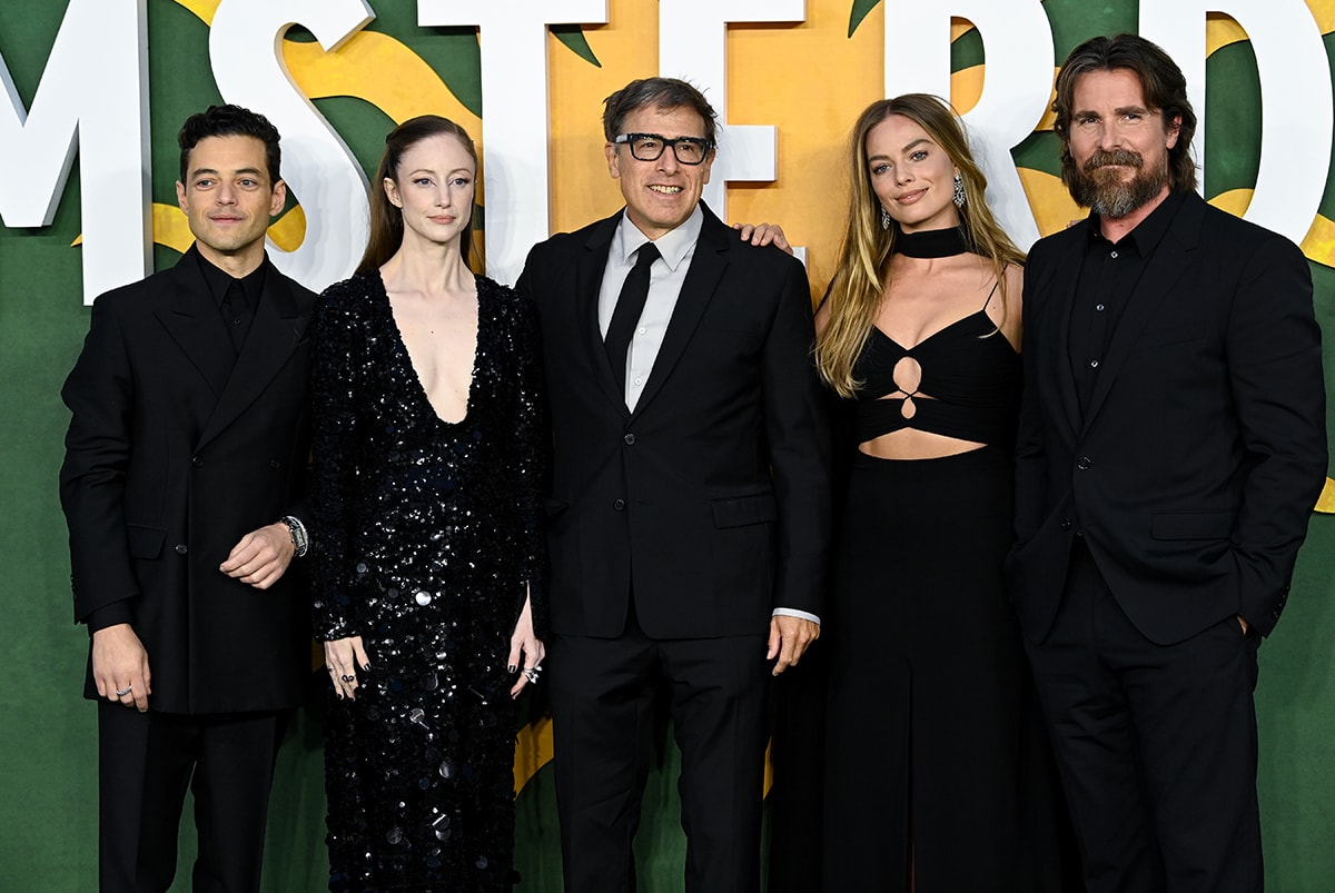 Rami Malek, Andrea Riseborough, David O. Russell, Margot Robbie, and Christian Bale don all-black outfits as a tribute to Queen Elizabeth II