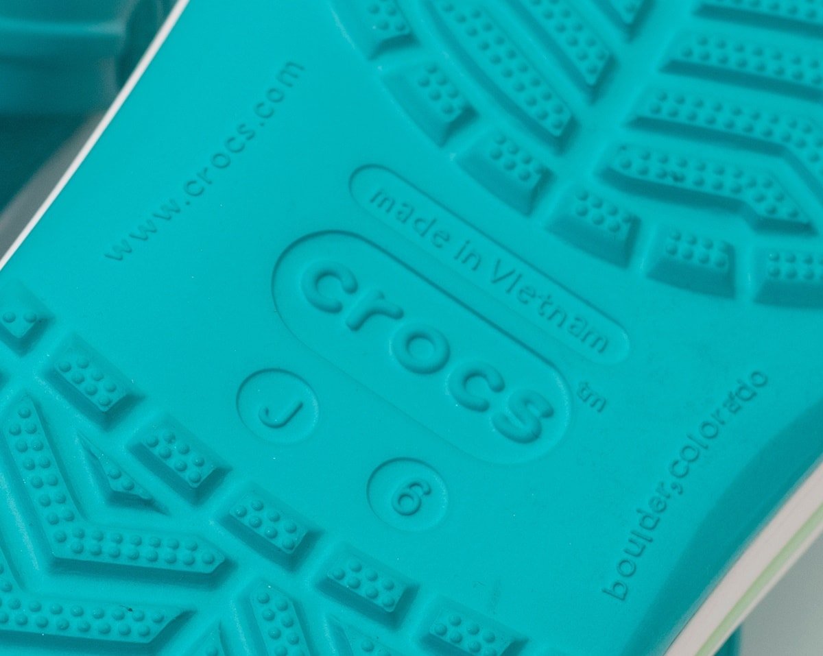 The sole of a real pair of Crocs will show you where the shoe was manufactured, sizing, website information, and that Crocs was founded in Boulder, Colorado