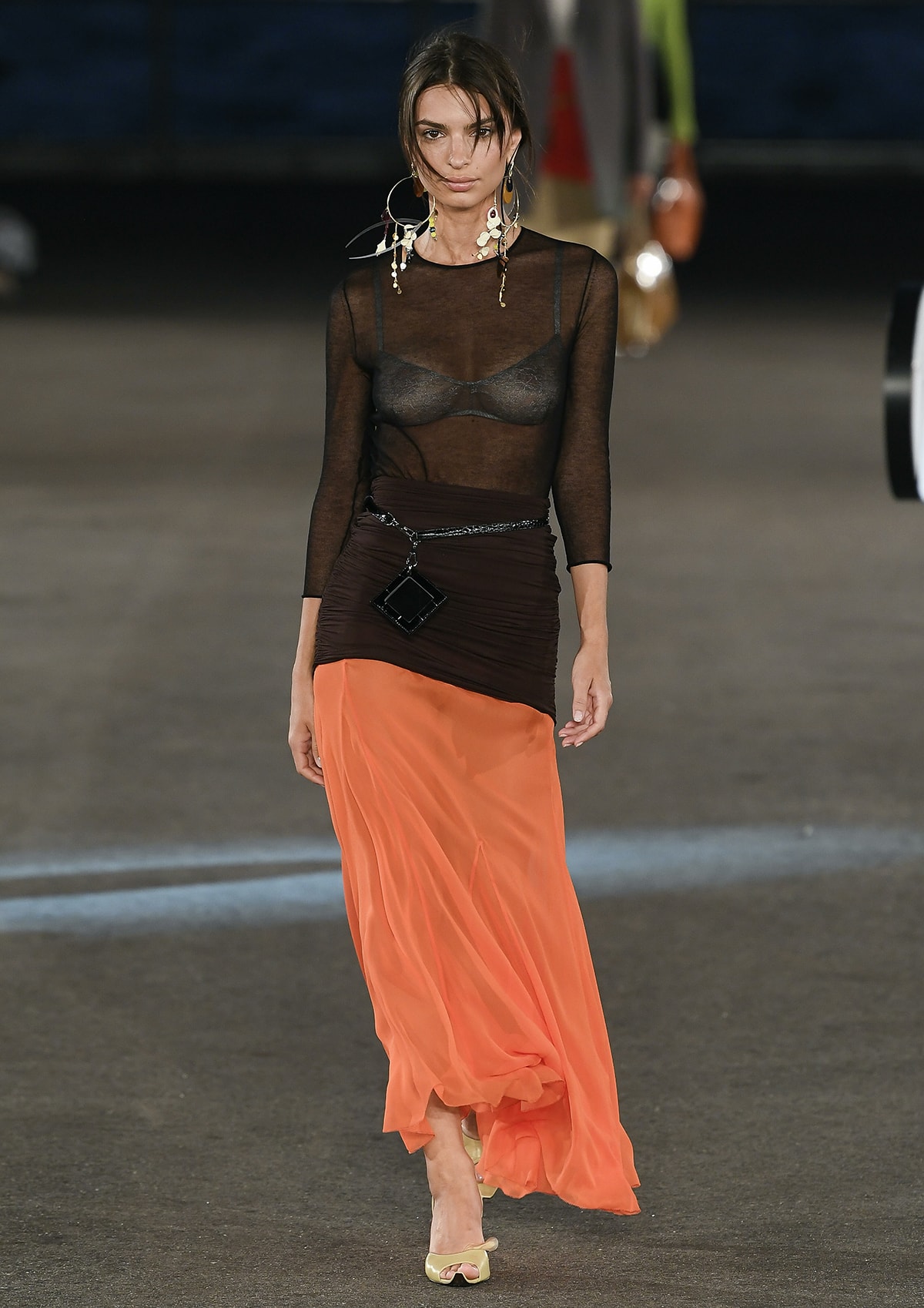 Emily Ratajkowski bares her boobs as she walks for Tory Burch during New York Fashion Week on September 13, 2022