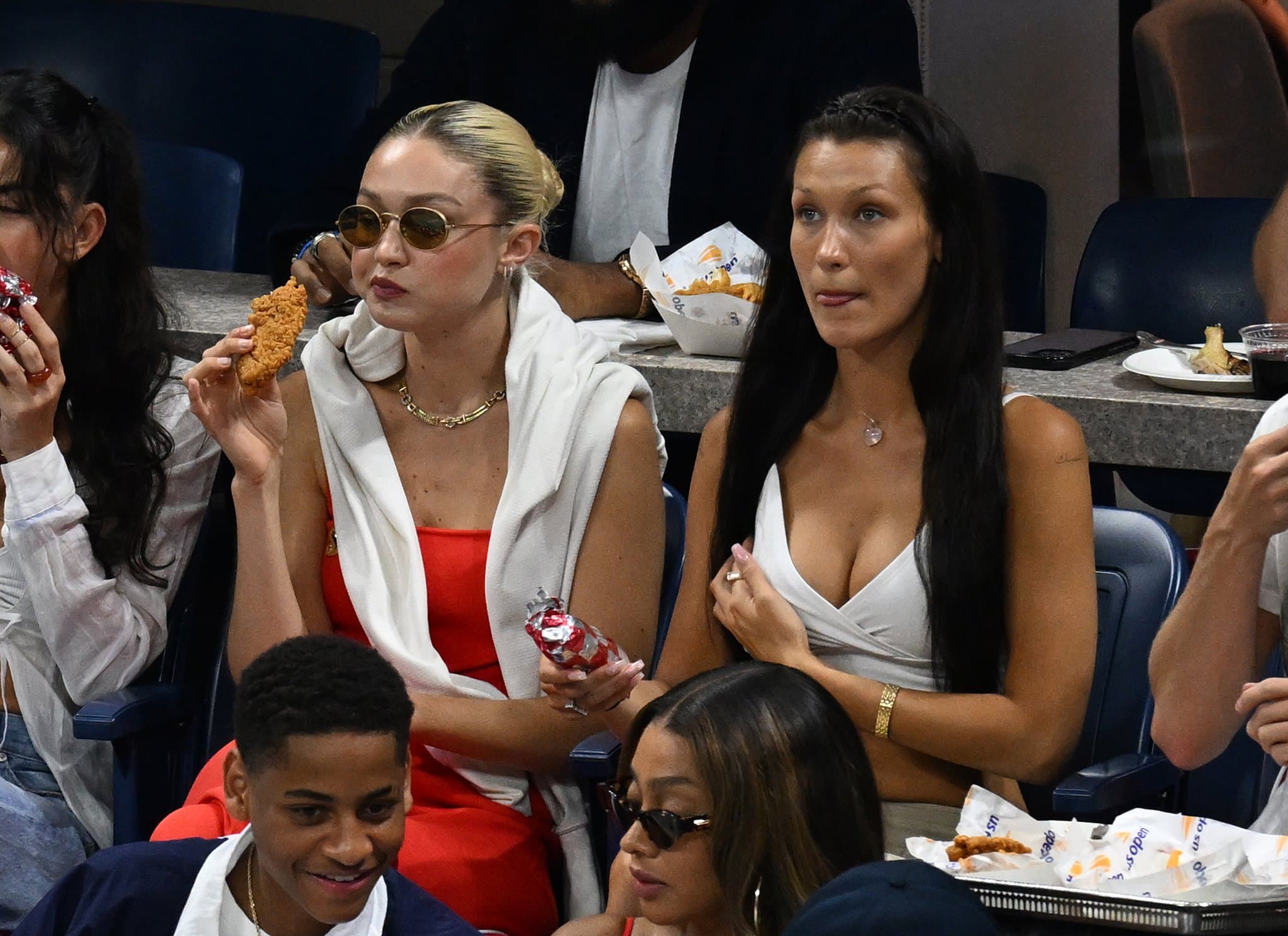 Sisters Gigi and Bella Hadid attend day 8 of the 2022 US Open
