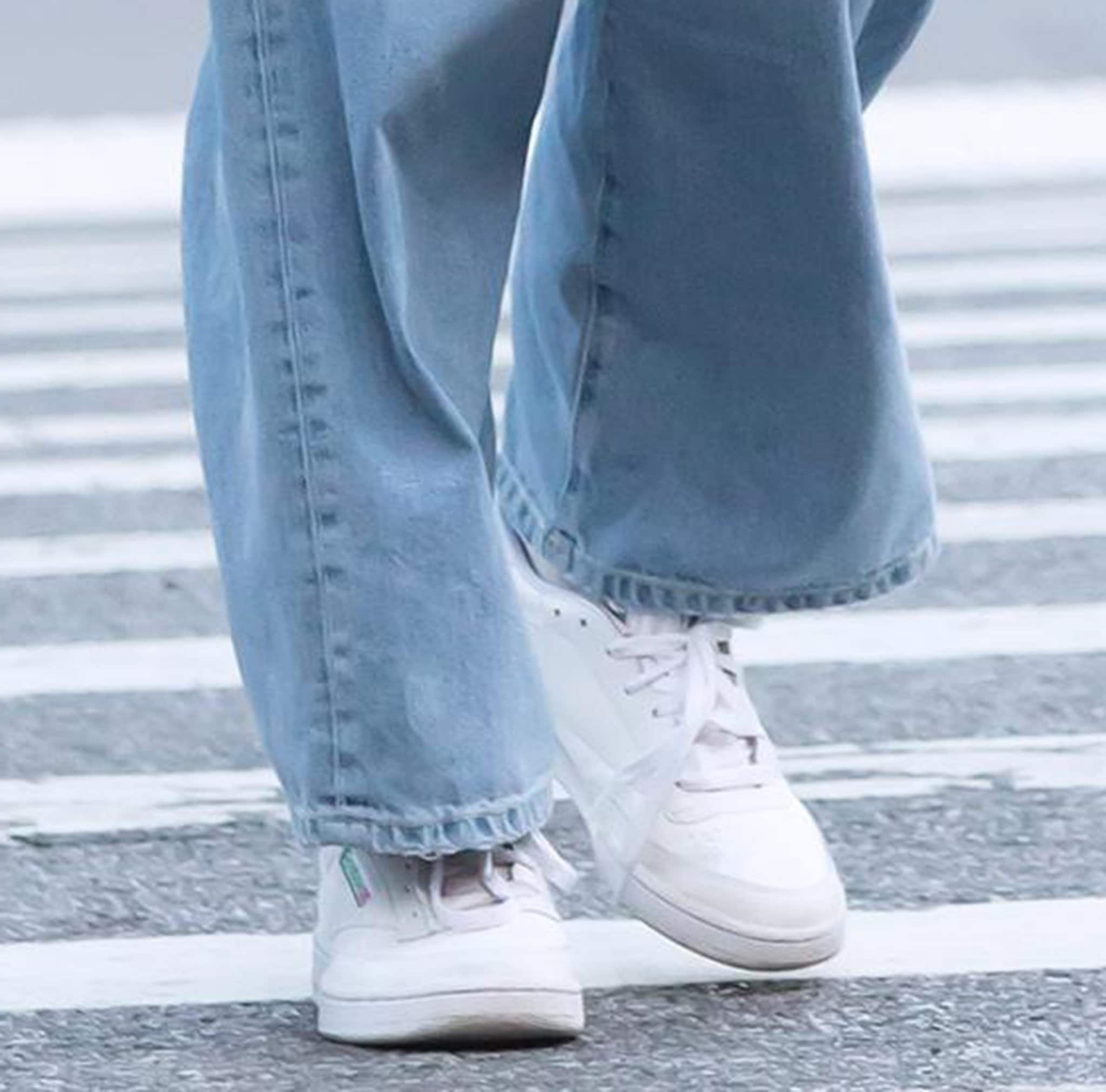 Gigi Hadid completes her throwback casual outfit with Reebok Club C 85 sneakers