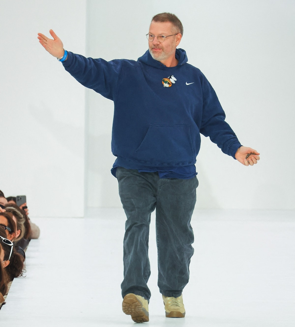 Designer Jonny Johansson, the creative director and co-founder of the Stockholm-based multidisciplinary fashion house Acne Studios, acknowledges the audience during the Acne Studios Womenswear Fall/Winter 2022/2023 show