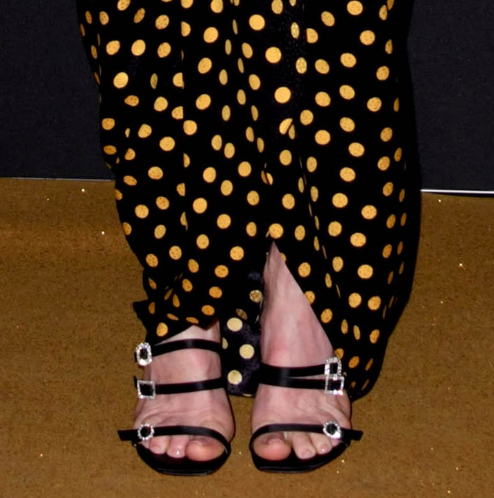 Julianne Moore shows off her feet in Amina Muaddi Robyn sandals
