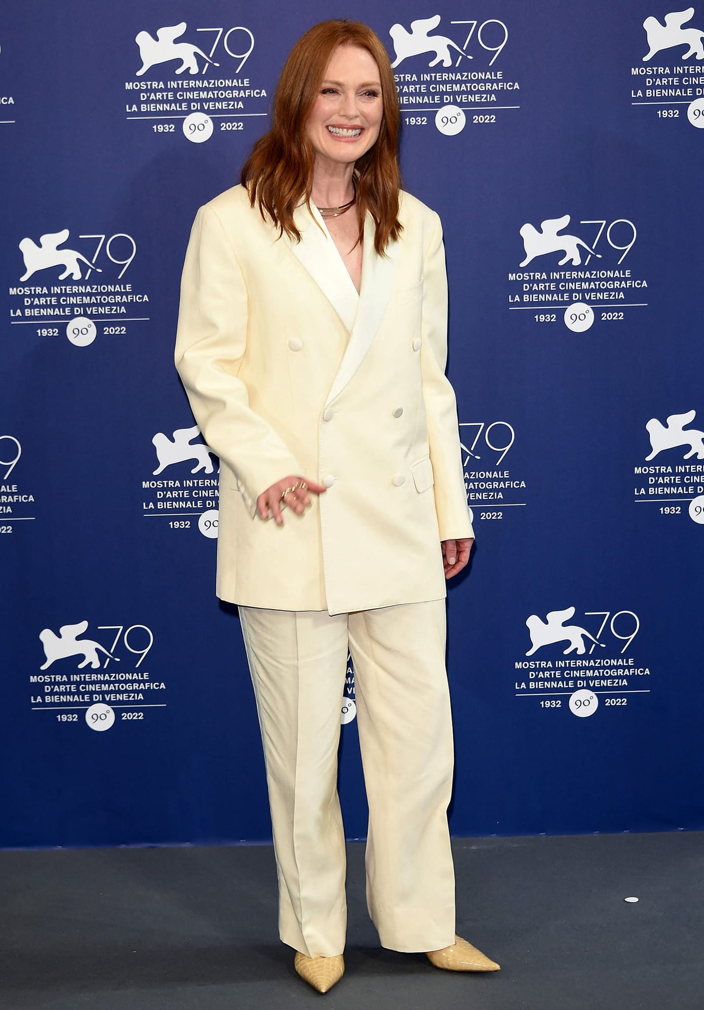 Jury president Julianne Moore attends the jury photocall for the 79th Venice Film Festival in a Celine trouser suit