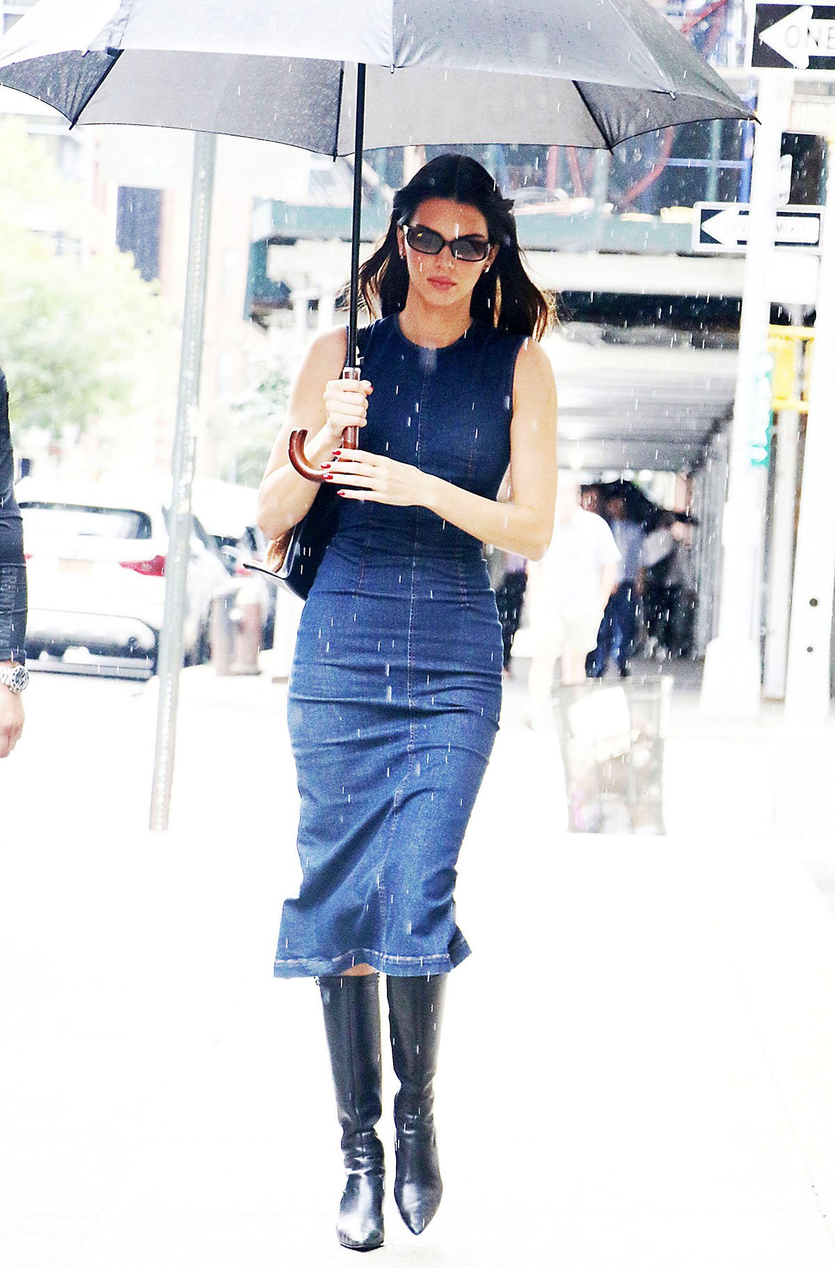 Kendall Jenner shows how to wear a sleeveless denim bodycon dress by Sportmax in SoHo
