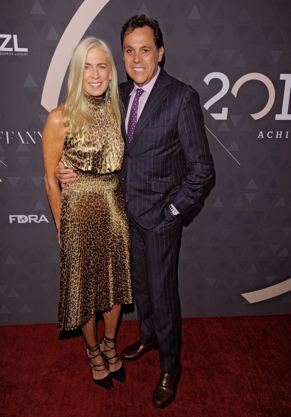 Married shoe designers Libby Edelman and Sam Edelman attend the 2018 Footwear News Achievement Awards