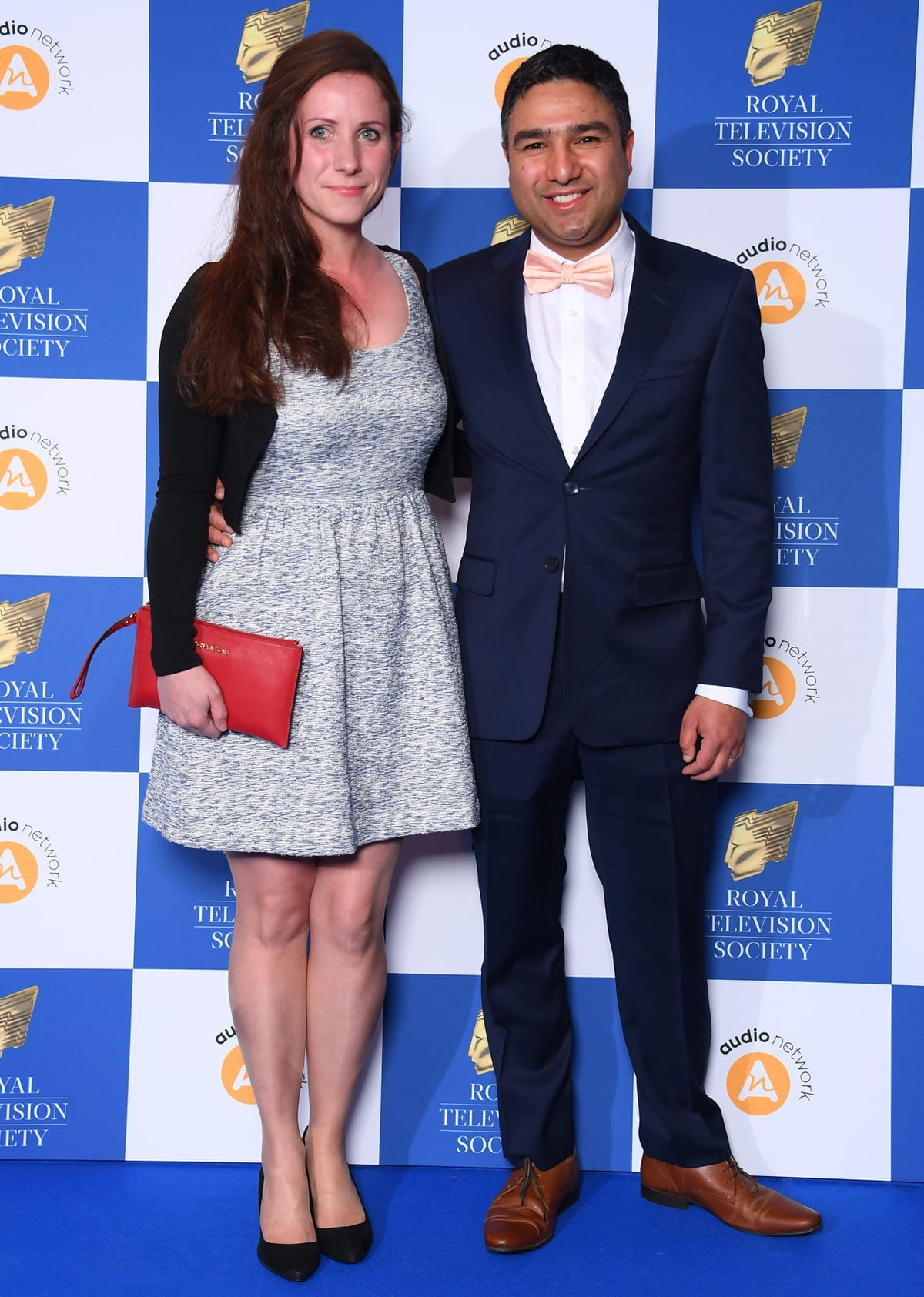 Nick Mohammed (R) and his taller wife Becka attend the Royal Television Society Programme Awards