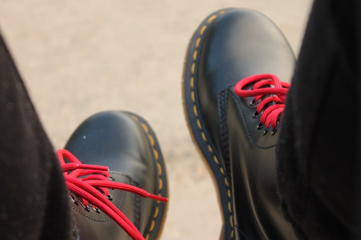 Dr. Martens fit true to size and should feel tight, but not uncomfortable
