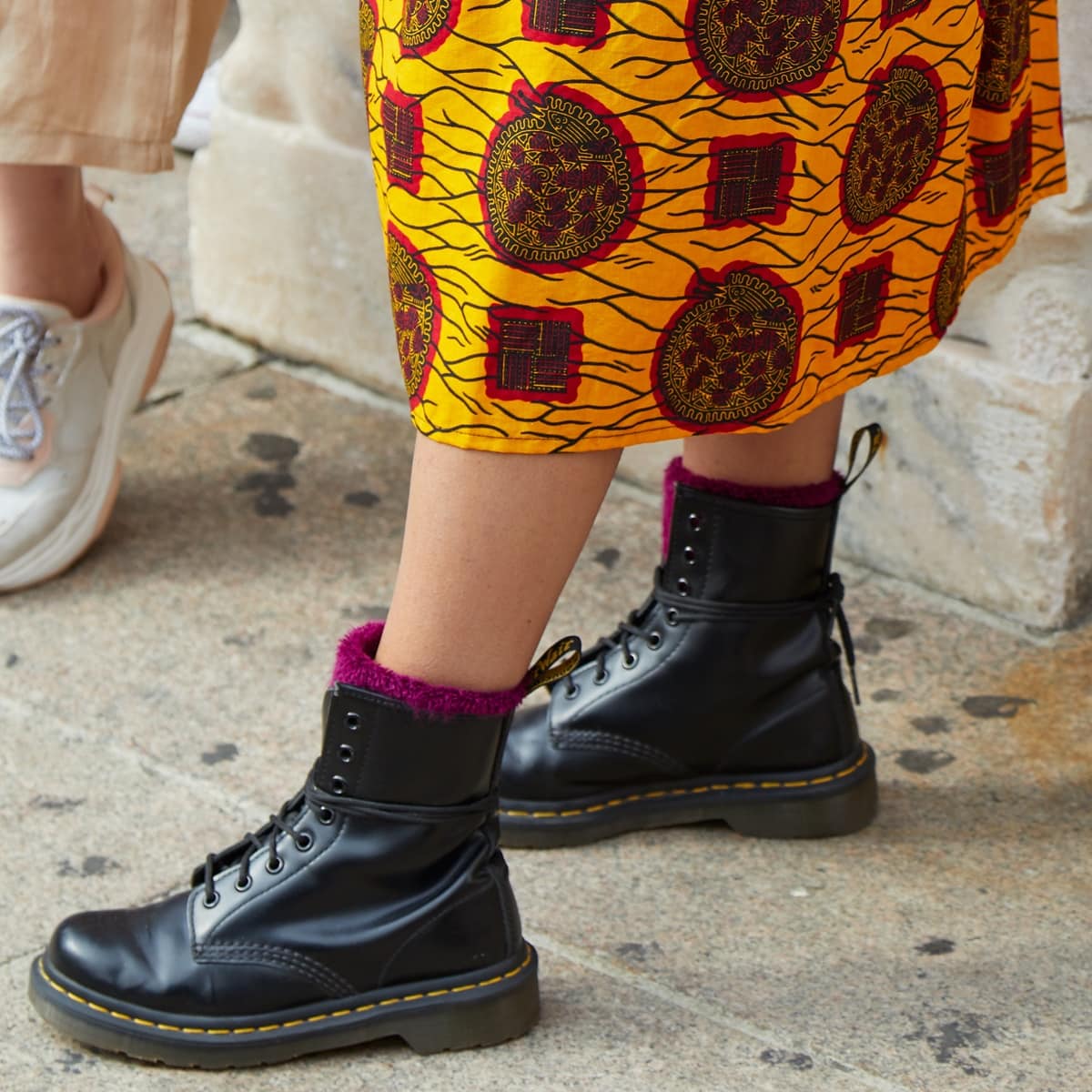 Wear the thickest sock you have when trying out your new Dr. Martens boots for the first time
