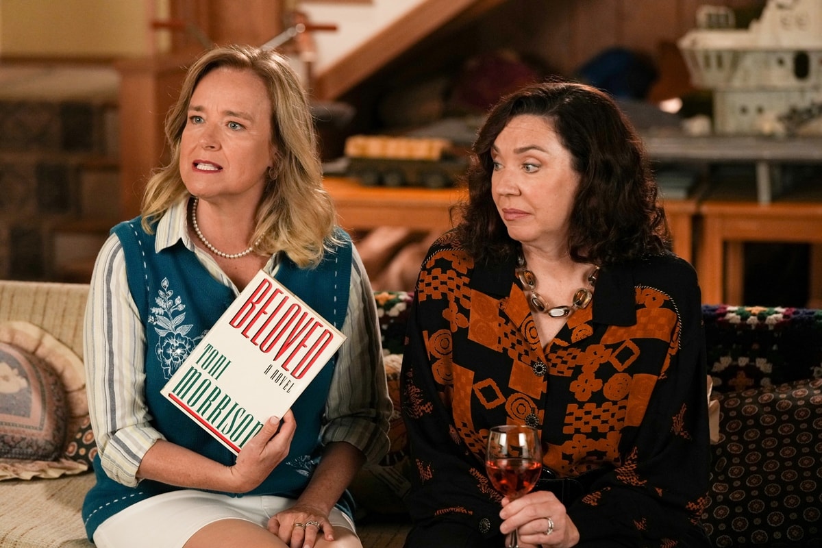 Stephanie Courtney as Essie Karp and Jennifer Irwin as Virginia "Ginzy" Kremp in the American period sitcom television series The Goldbergs