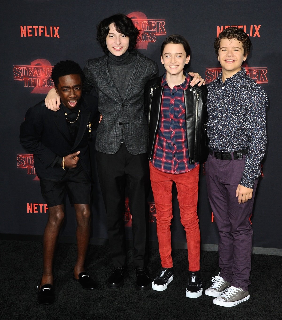 Actors Caleb McLaughlin, Finn Wolfhard, Noah Schnapp, and Gaten Matarazzo arrive at the Premiere Of Netflix's 'Stranger Things' Season 2