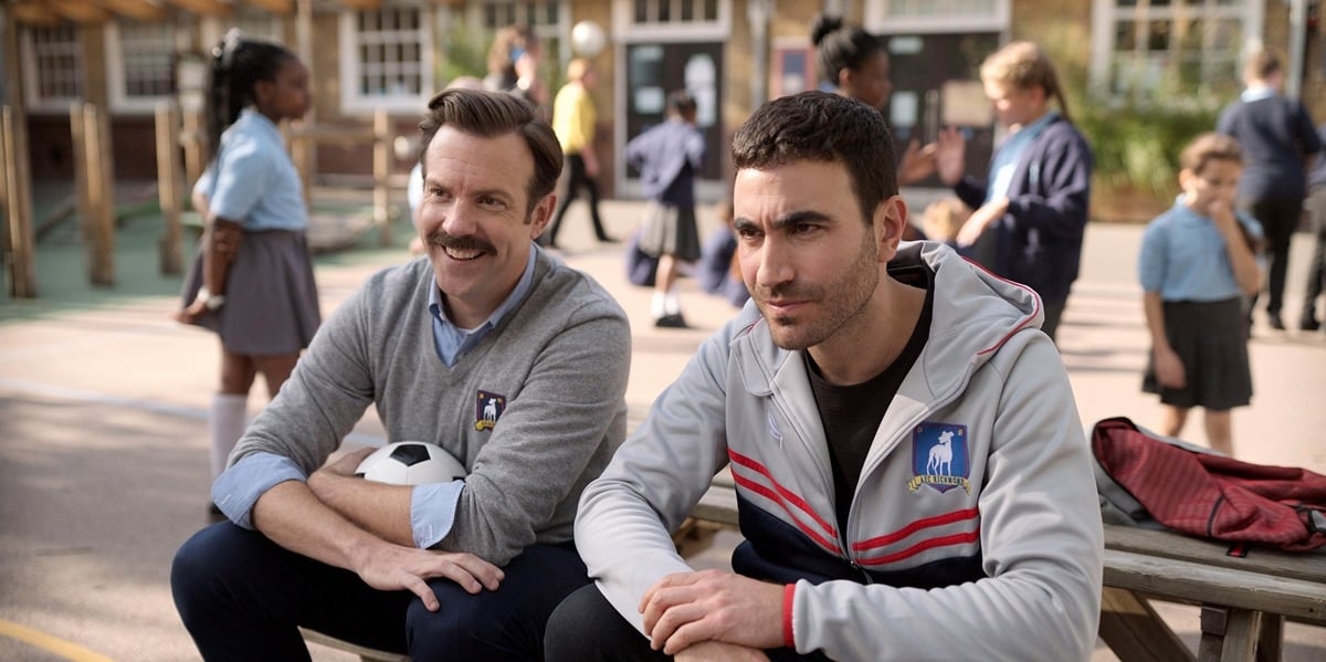 Brett Goldstein as Roy Kent and Jason Sudeikis as Ted Lasso in the American sports comedy-drama television series Ted Lasso