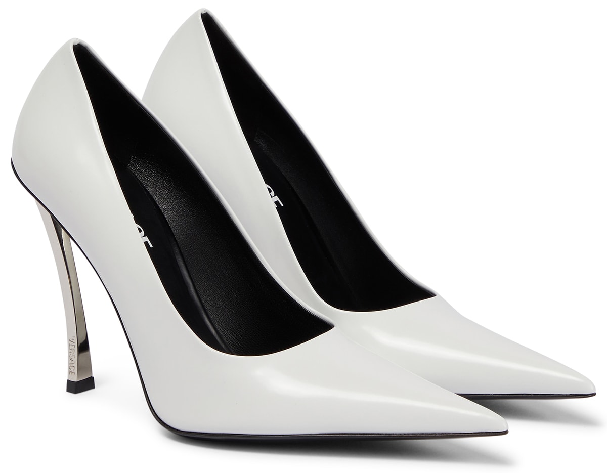 The Versace Pin-Point pumps boast a curved metal stiletto heel and an elongated pointed toe