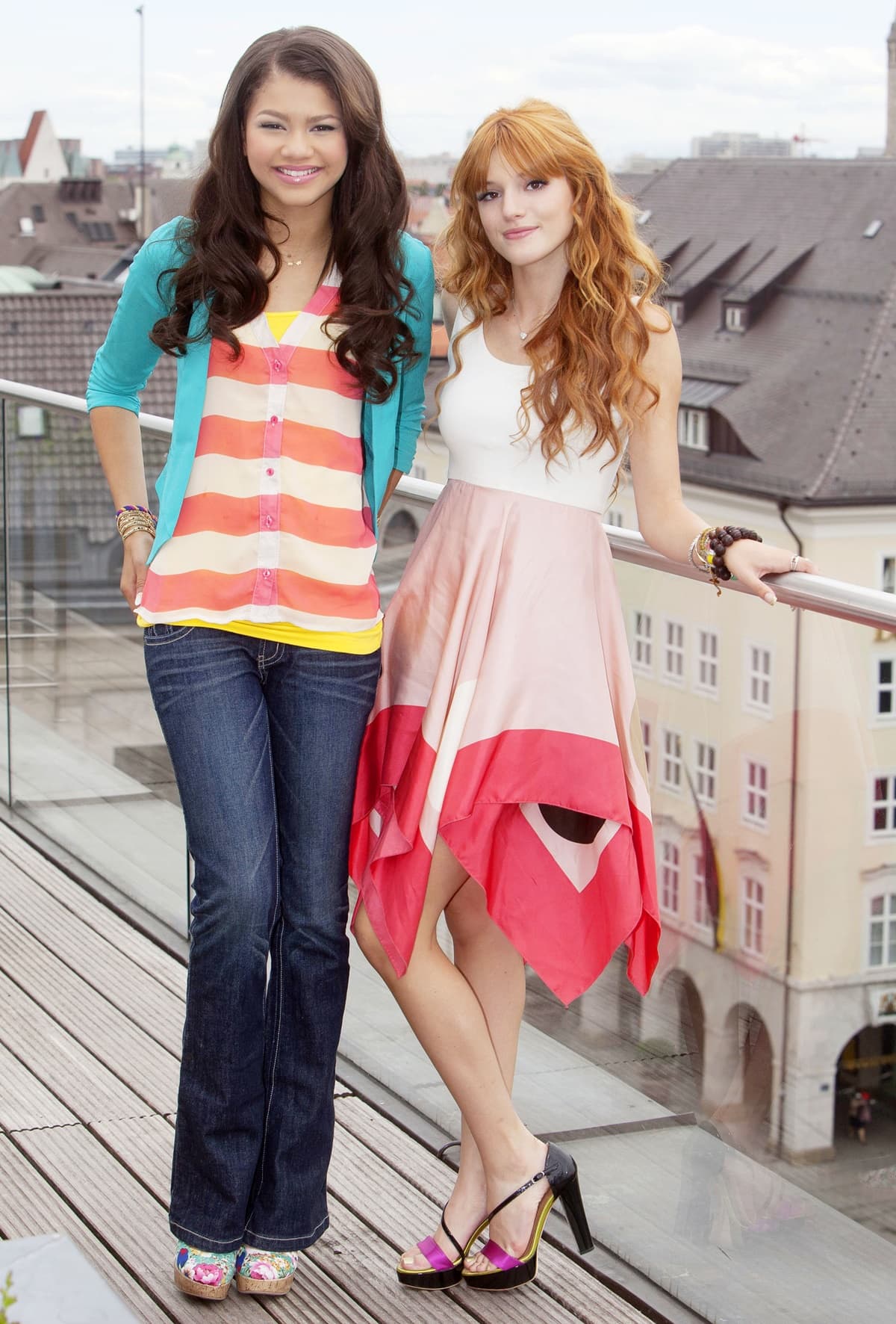 Bella Thorne and Zendaya on a rooftop during a photo call for their hit Disney show, Shake It Up, in Munich