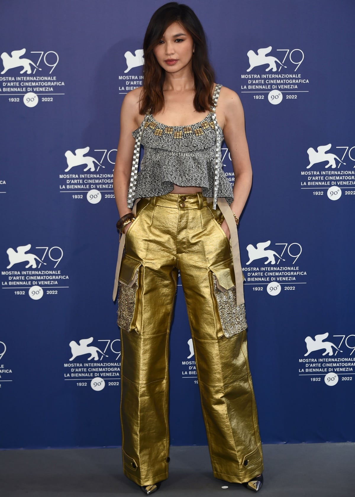 Gemma Chan wearing a tough-chic Louis Vuitton look at the Don’t Worry Darling photocall