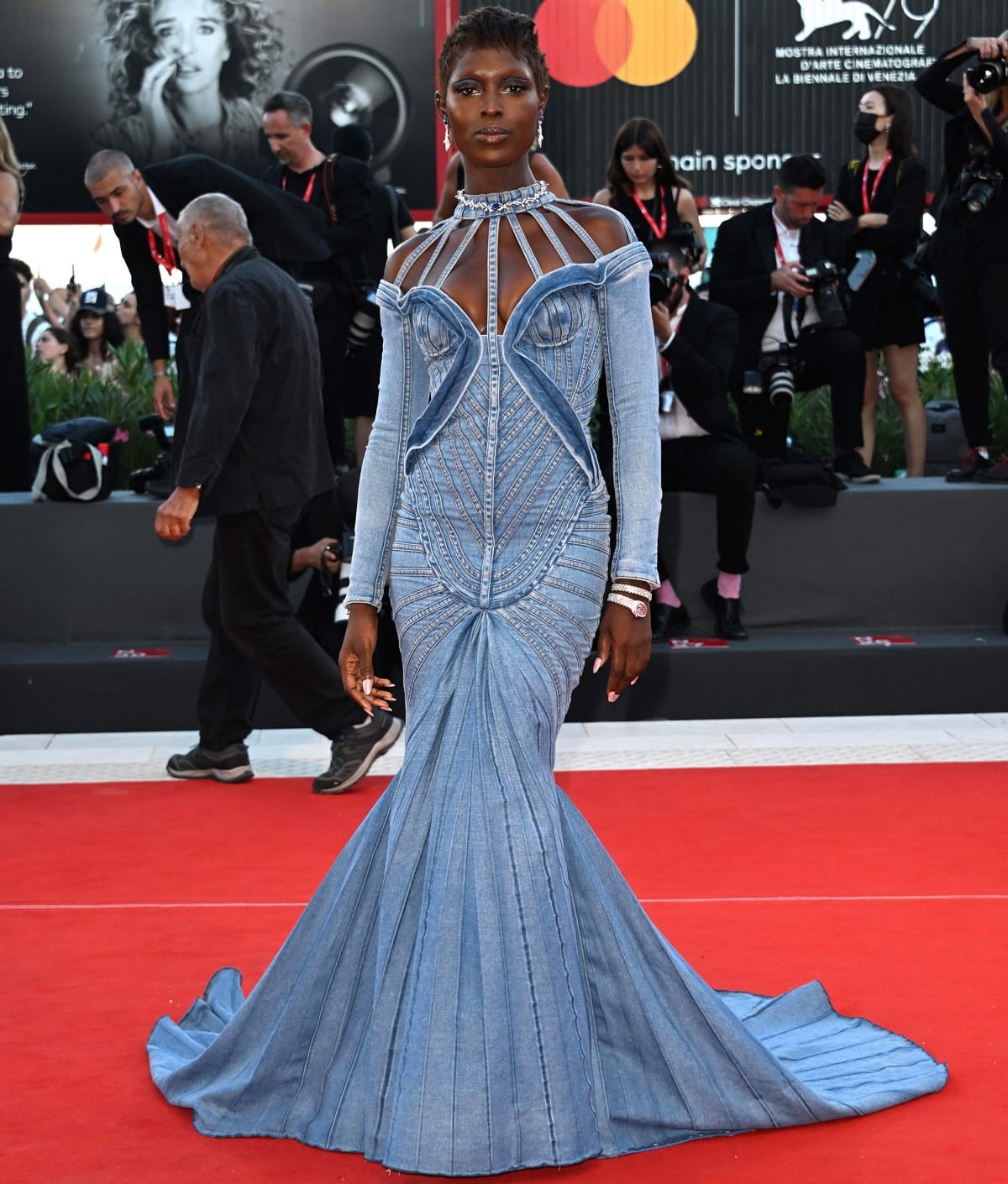 Jodie Turner-Smith wearing a custom Balmain denim fishtail gown on the red carpet