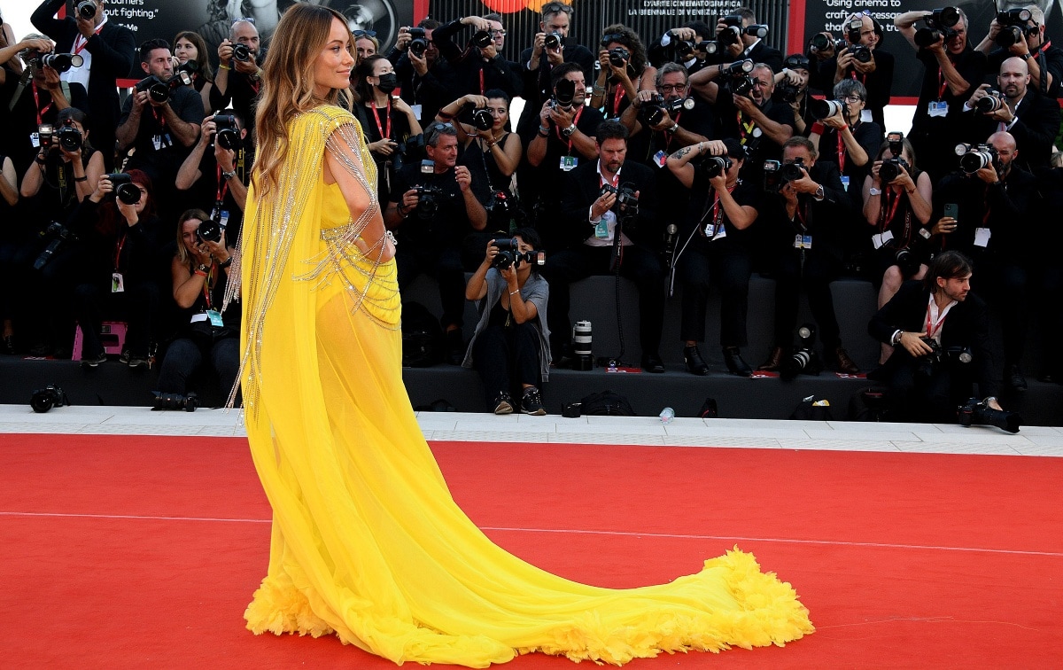 Director Olivia Wilde posing for photographs on the red carpet during the 79th Venice International Film Festival