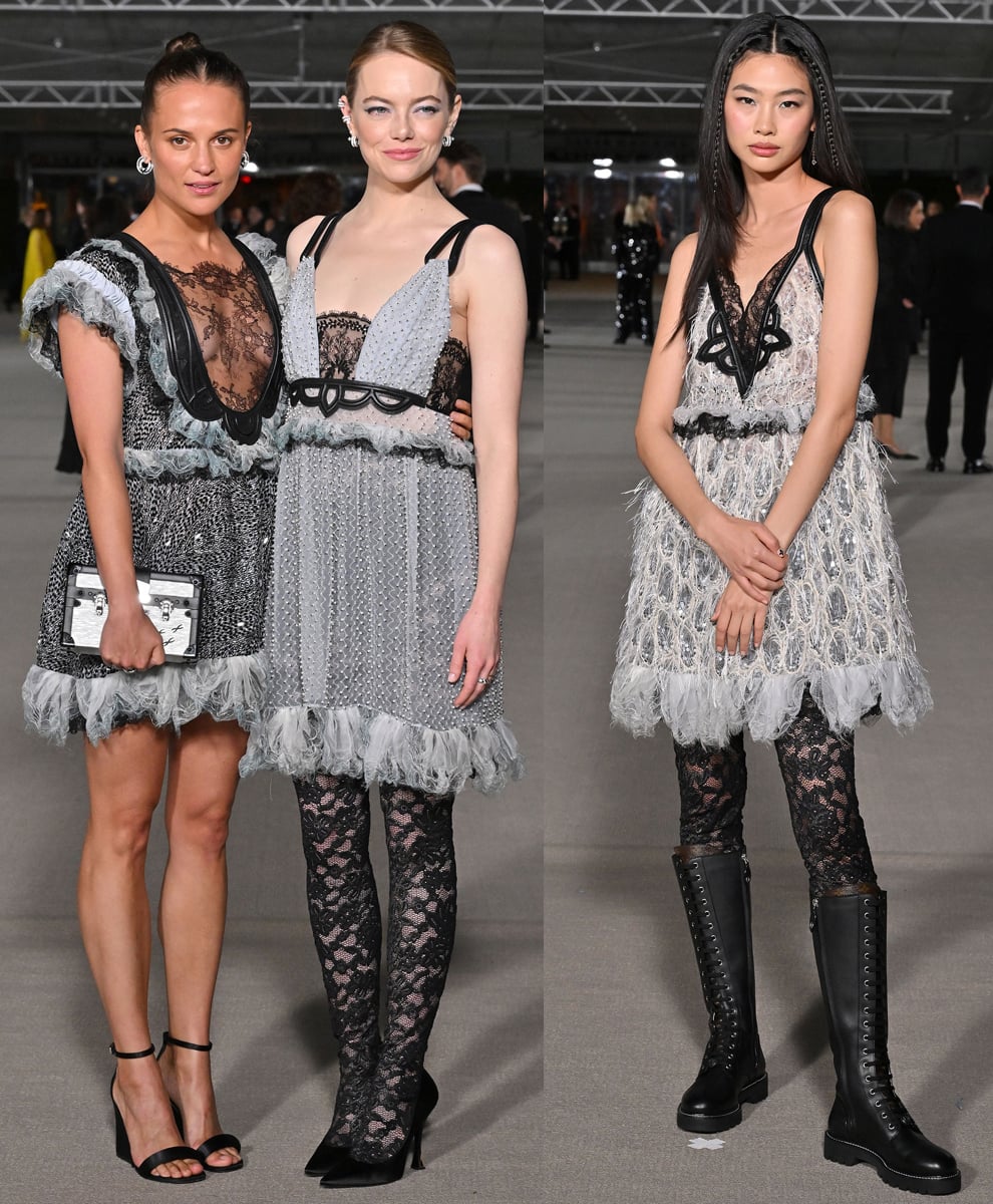Alicia Vikander, Emma Stone, and HoYeon Jung wear strikingly similar Louis Vuitton mini dresses with feathers, lace panels, and leather trims