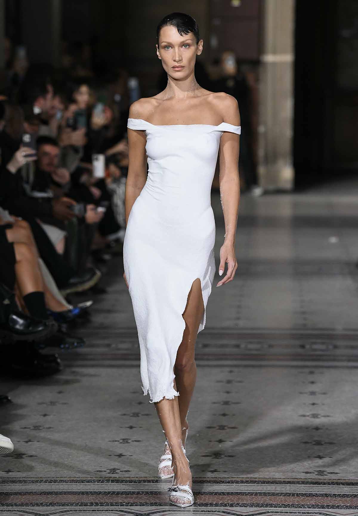 Bella Hadid goes viral for her white spray-on dress during Coperni's Spring/Summer 2023 show during Paris Fashion Week