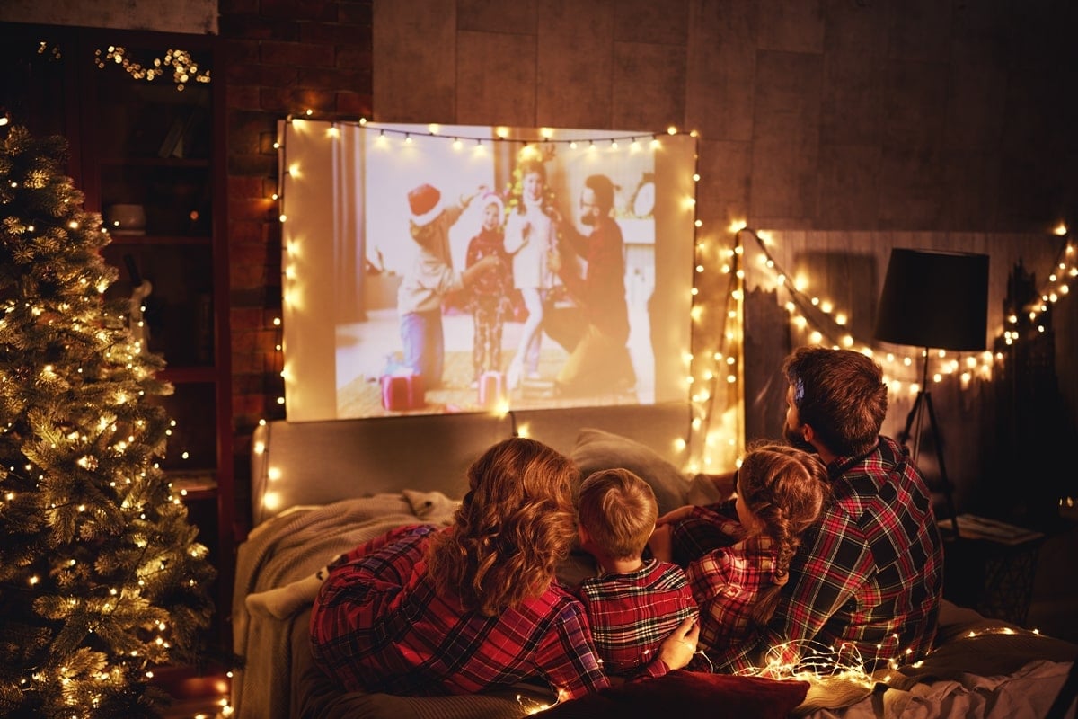 Staying in to watch movies together on Christmas is one of the most popular holiday traditions for families