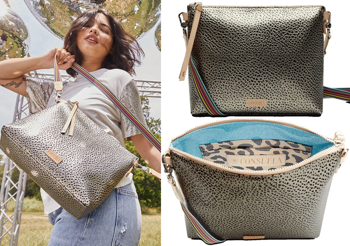 The Tommy Downtown is a sleek crossbody bag with a roomy interior, two interior pockets, and an adjustable strap