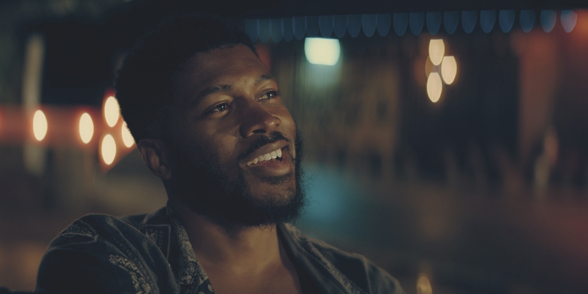 Eli Goree portrays Conner, a man recruited to help with the situation within the peripheral world, in Amazon's The Peripheral