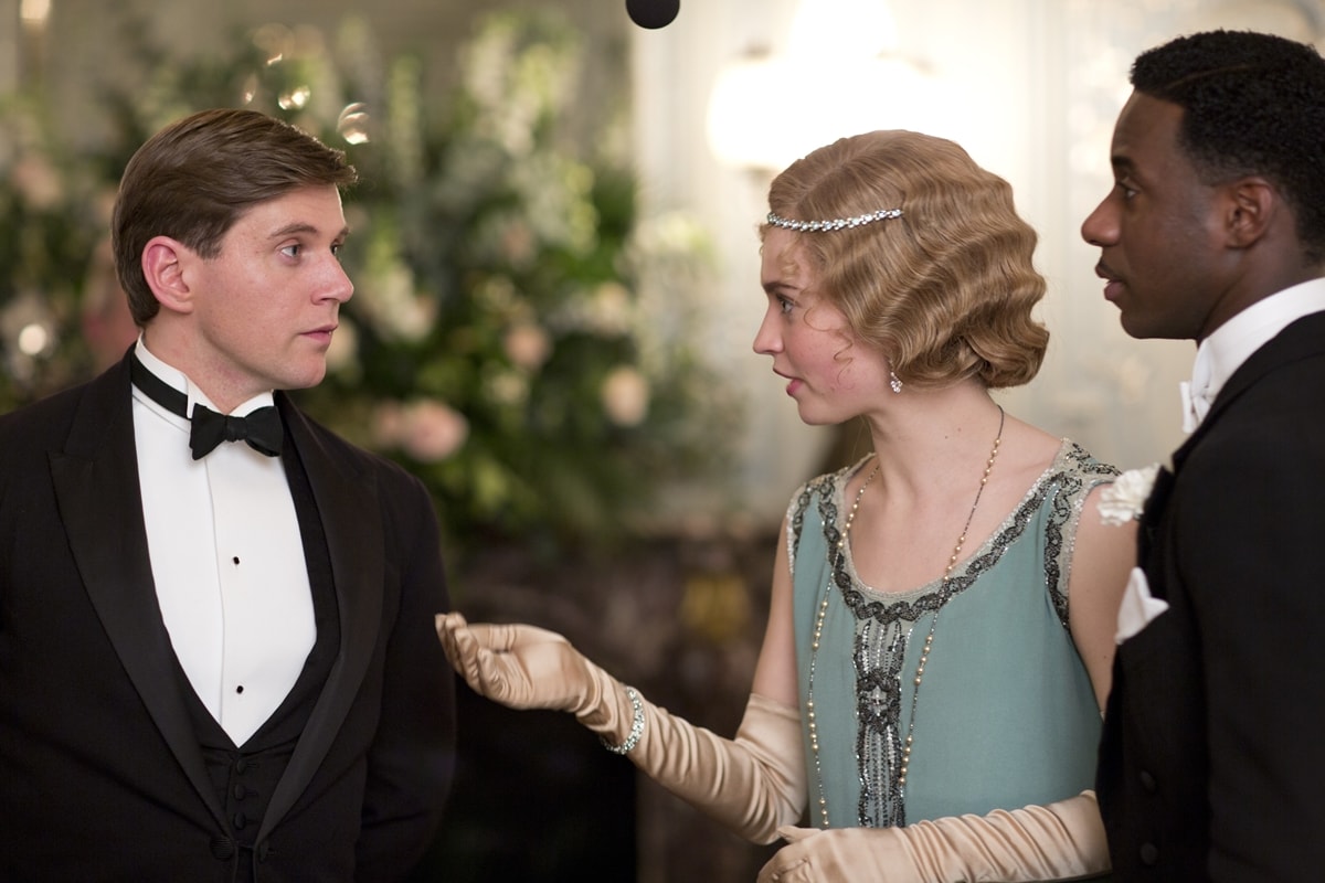 Gary Carr as American Jazz singer Jack Ross, Lily James Rose MacClare, and Allen Leech Tom Branson in the ITV historical drama Downton Abbey