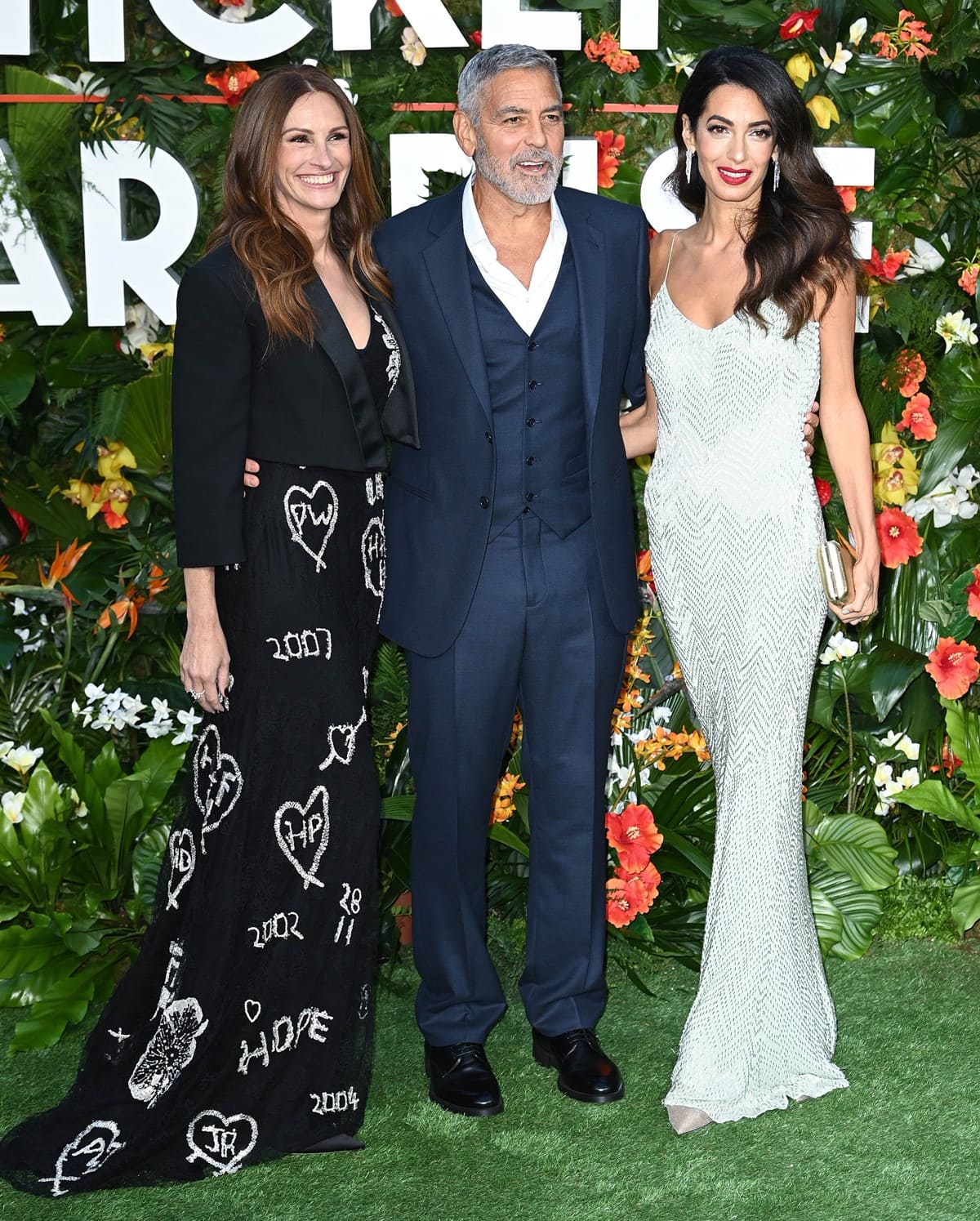 Julia Roberts, Amal Clooney, and George Clooney attend the 