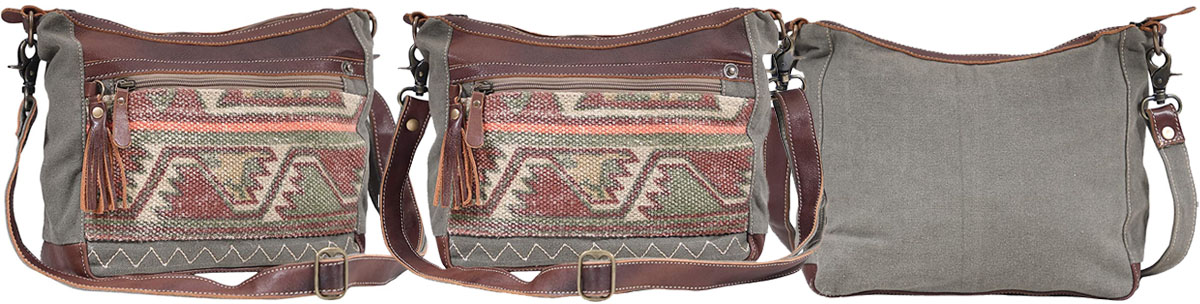 The Luguni bag boasts a tribal Aztec design handcrafted from up-cycled canvas with vintage leather trims