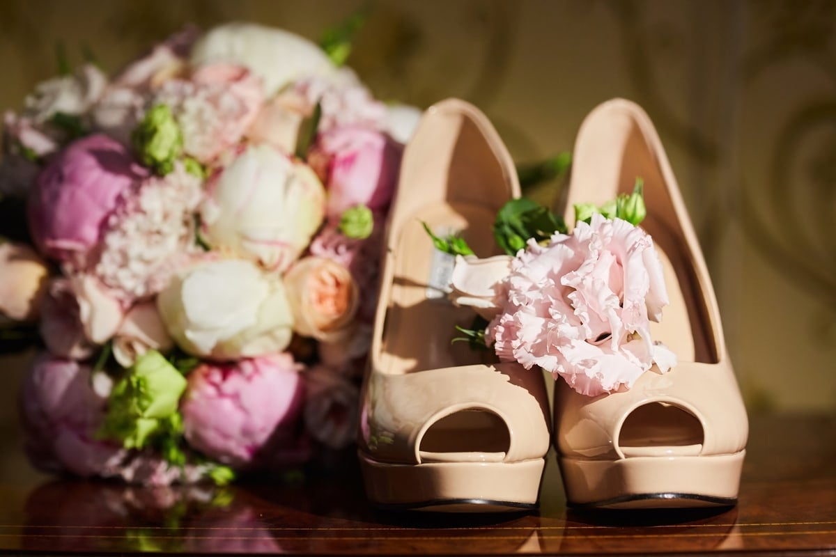 Considered more formal than open-toe shoes, Peep-toe wedding heels are a bridal favorite