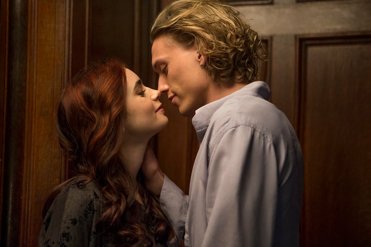 Lily Collins as Clary and Jamie Campbell Bower as Jace in the 2013 urban fantasy film The Mortal Instruments: City of Bones