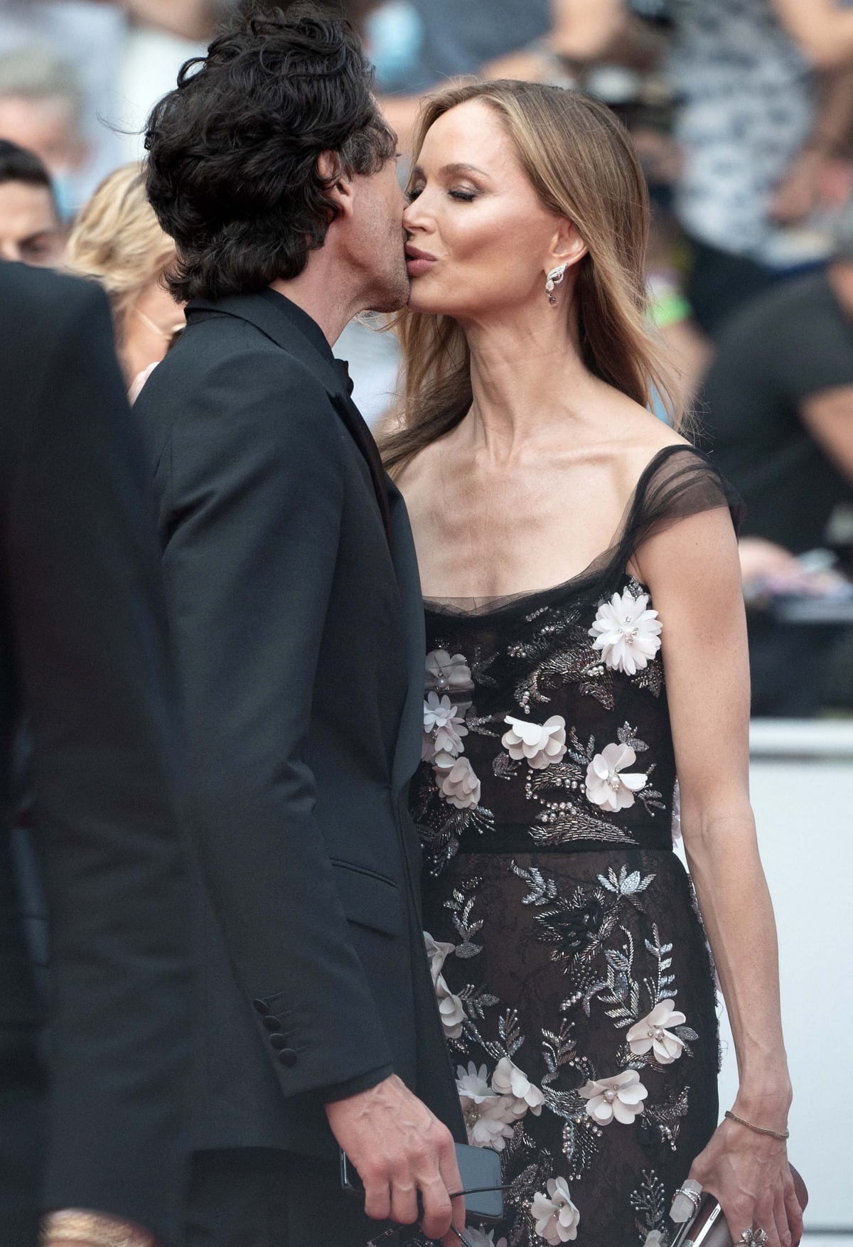 Adrien Brody and Georgina Chapman making a rare public display of affection at The French Dispatch premiere during the 74th Cannes Film Festival