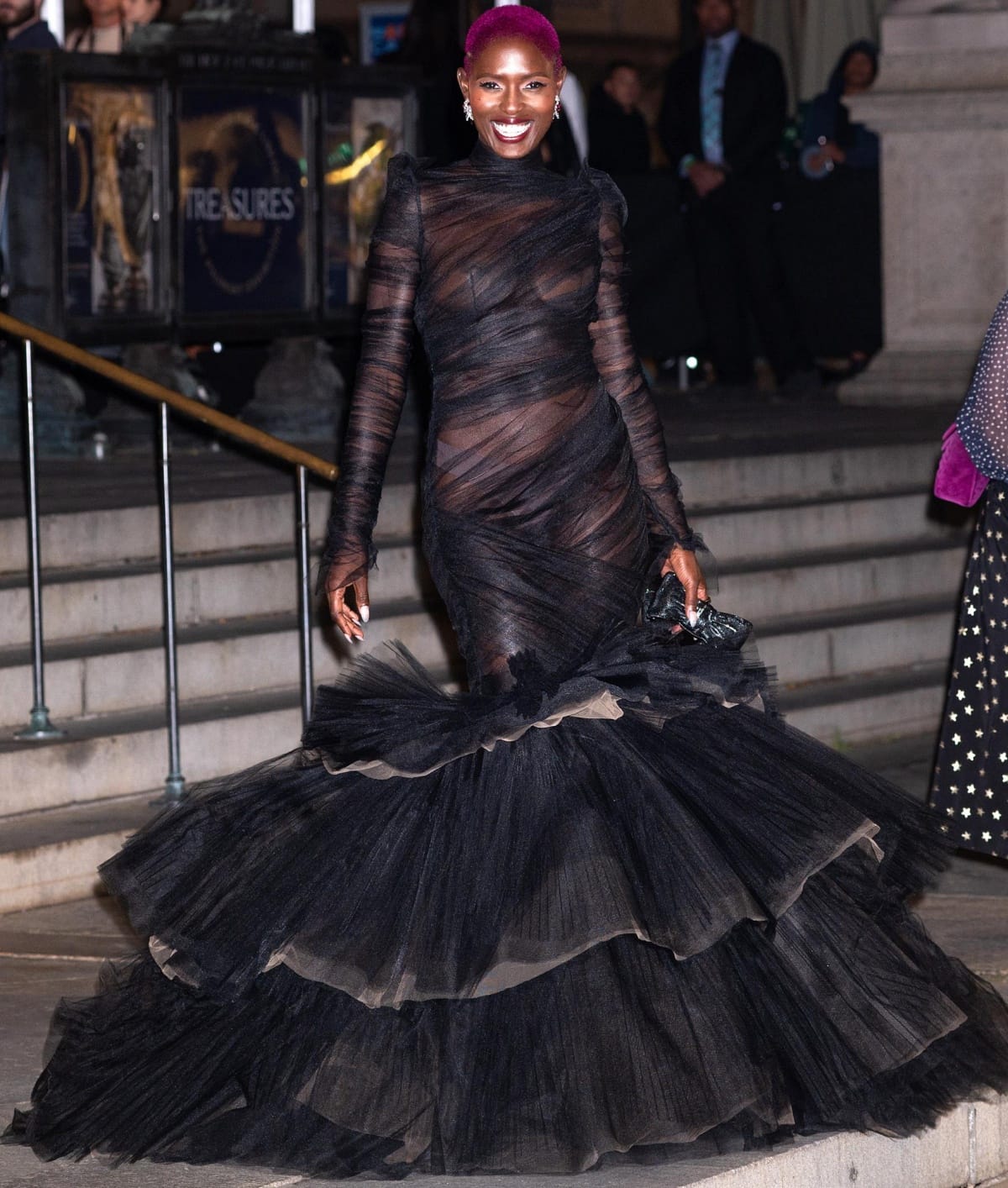 Jodie Turner-Smith wearing a Christian Siriano sheer black gown with a tiered mermaid skirt at the Clooney Foundation for Justice Inaugural Albie Awards
