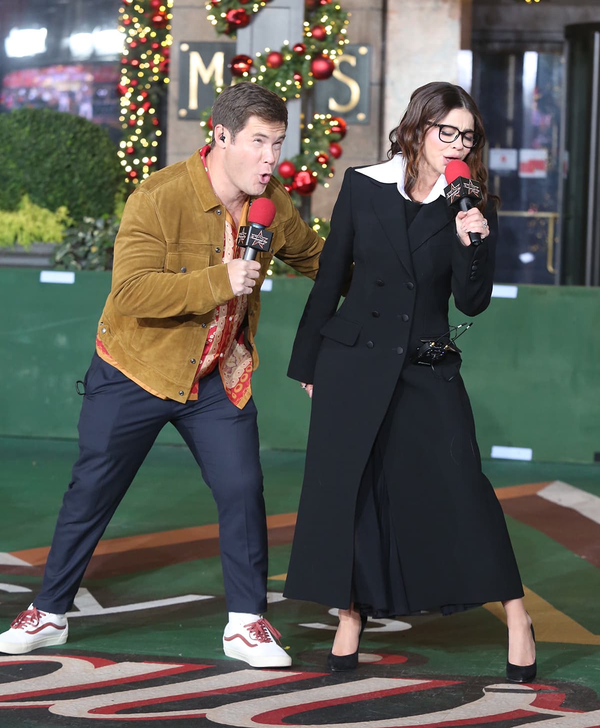 Adam Devine and Sarah Hyland rehearsing for Macy's Thanksgiving Day Parade on November 22, 2022